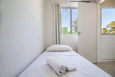 Uma cama ou camas num quarto em Beach Townhouses - Duplex com Jacuzzi by Carpediem