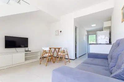 Uma televisão e/ou sistema de entretenimento em Beach Townhouses #C3 - Casa equipada por Carpediem