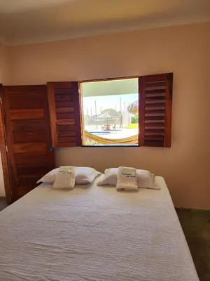 Uma cama ou camas num quarto em Cabanas da Sorte