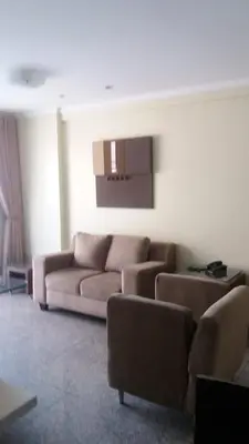 Uma área de estar em Apartamento vista mar