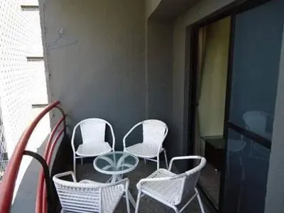 Uma varanda ou terraço em Apartamento vista mar