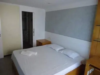 Uma cama ou camas num quarto em Apartamento vista mar