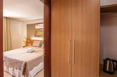 Uma cama ou camas num quarto em [KaririBeach319B] Suíte com vista incrível