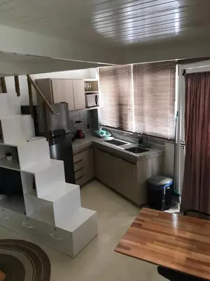 Uma área de estar em Tiny House Jeri