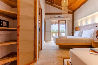 Uma cama ou camas num quarto em CASA na PRAIA DA BARRINHA Frente Mar