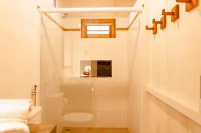 Uma casa de banho em CASA na PRAIA DA BARRINHA Frente Mar