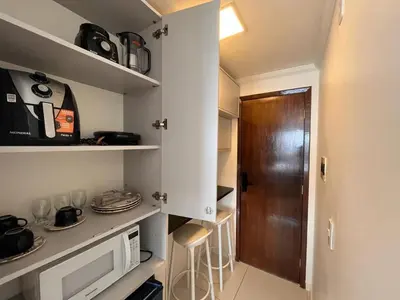 A cozinha ou kitchenette de Hosts BR - Flat frente mar c/ cozinha