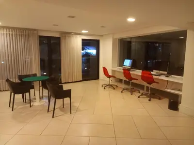 Uma televisão e/ou sistema de entretenimento em Landscape Beira Mar Fortaleza