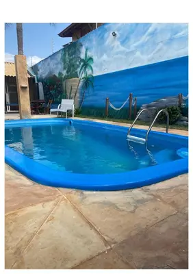A piscina em ou perto de Home Beach Mar Conforto Self-Hosted