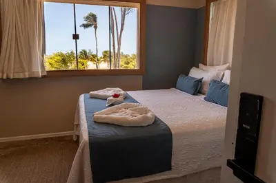 Uma cama ou camas num quarto em Isla Beach Hotel