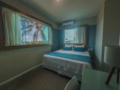 Uma cama ou camas num quarto em Isla Beach Hotel