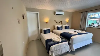 Uma cama ou camas num quarto em Isla Beach Hotel