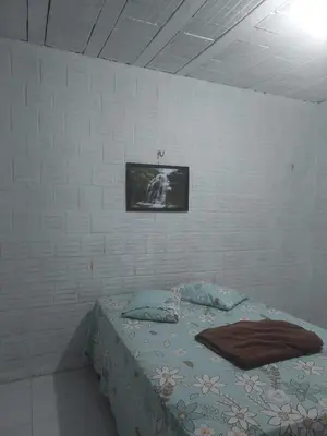 Uma cama ou camas num quarto em Chalés Catim da Felicidade