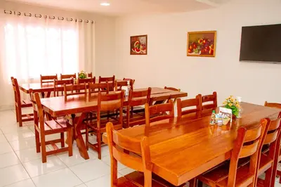 Uma televisão e/ou sistema de entretenimento em Hotel Letiva Centro