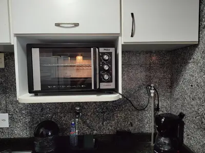 A cozinha ou kitchenette de Iracema Flat frente mar 107