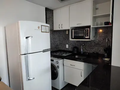 A cozinha ou kitchenette de Iracema Flat frente mar 107