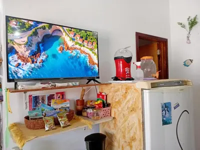 A cozinha ou kitchenette de Chale Canoa Beach