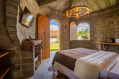Uma cama ou camas num quarto em Pousada TRIBUS experience