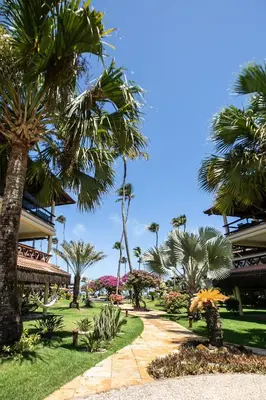 Um jardim no exterior de Dream Village Paradise - 403H