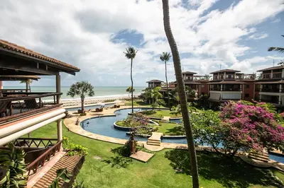 Um jardim no exterior de Dream Village Paradise - 403H