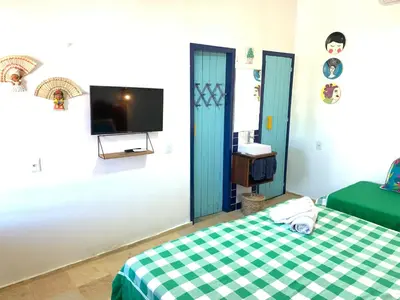 Uma cama ou camas num quarto em Maria Flor Pousada