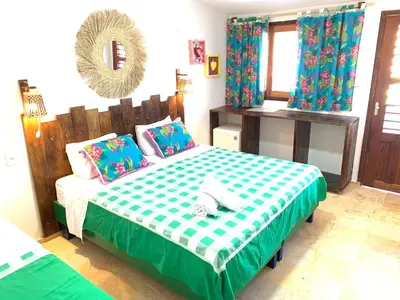 Uma cama ou camas num quarto em Maria Flor Pousada