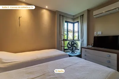 Uma cama ou camas num quarto em Bangalô vista mar no VG Sun Cumbuco por Tactu