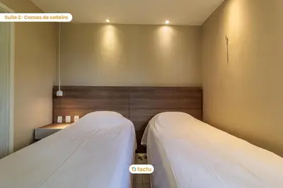 Uma cama ou camas num quarto em Bangalô vista mar no VG Sun Cumbuco por Tactu