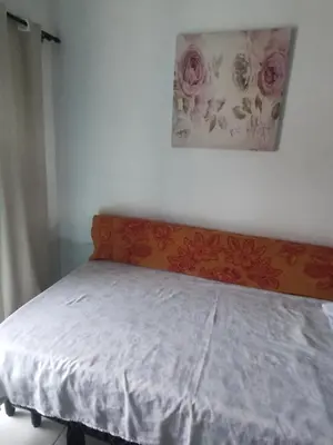 Uma cama ou camas num quarto em Hospedagens Icapui Mare Blu