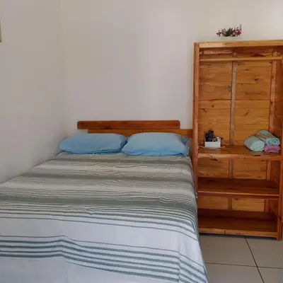 Uma cama ou camas num quarto em Hospedagens Icapui Mare Blu