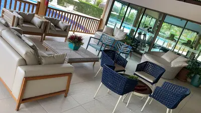 Uma área de estar em Apartamento Cumbuco, c2 307