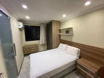 Uma cama ou camas num quarto em Modern apartment with Ocean View - 500m from Beach