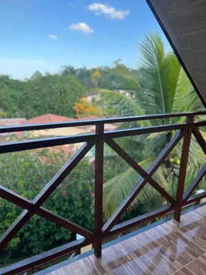 Uma varanda ou terraço em Chalé das Flores
