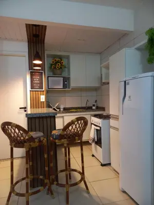 A cozinha ou kitchenette de Apartamento Porto das Dunas