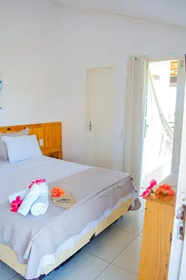 Uma cama ou camas num quarto em Milano Hotel Pousada Canoa Quebrada