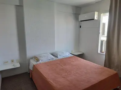 Uma cama ou camas num quarto em Flat frente mar Fortaleza 607