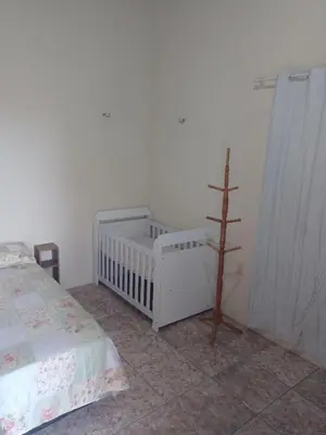 Uma cama ou camas num quarto em Terra da Luz - Casa de praia CE