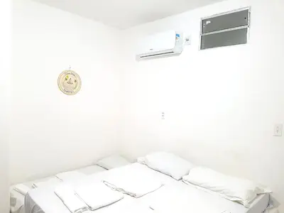 Uma cama ou camas num quarto em Casa Brisa