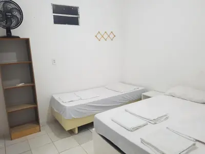 Uma cama ou camas num quarto em Casa Brisa