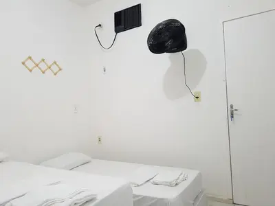 Uma cama ou camas num quarto em Casa Brisa
