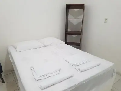 Uma cama ou camas num quarto em Casa Brisa