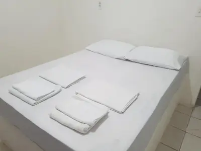 Uma cama ou camas num quarto em Casa Brisa