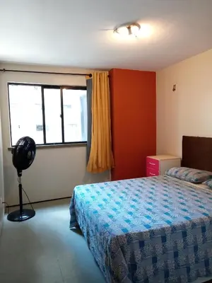 Uma cama ou camas num quarto em Apartamento 3 quartos a 100 m da Beira Mar