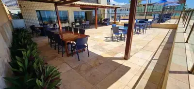 Um restaurante ou outro lugar para comer em Flat na praia de iracema 504