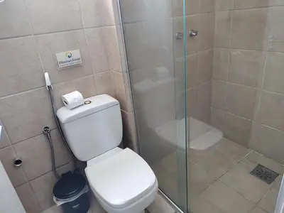Uma casa de banho em Meireles Família LC FLATS 1307
