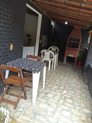 Uma área de estar em Pousada Aconchego no Frio
