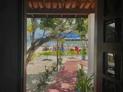 Um jardim no exterior de Pousada Paraiso Verão