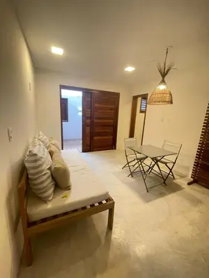 Uma área de estar em Novo Apê Fabiano