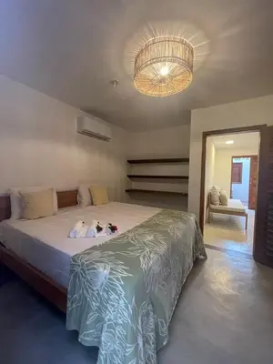 Uma cama ou camas num quarto em Novo Apê Fabiano