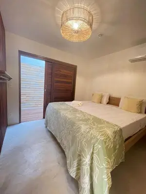 Uma cama ou camas num quarto em Novo Apê Fabiano